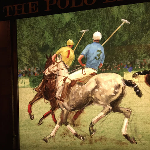 Store front painting with two polo players